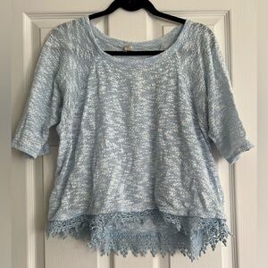 No Boundaries cropped blue sweater. Blue lace on bottom trim. Size L/XL.